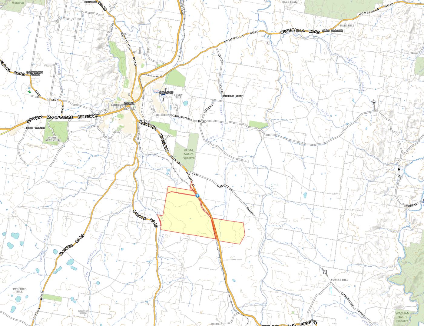 Topographic map of the Cooma district showing the town of Cooma, the Monaro Highway and Snowy Mountains Highway, and the approximate site outlined immediately south of Cooma at Rock Flat.